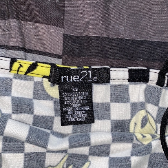 Black/white plaid crop too with spaghetti sleeves and drip smiley face pattern. - Picture 3 of 3